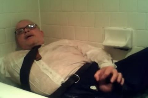 Pants Shirt And Tie And Shoes  And Socks In Tub With sperm